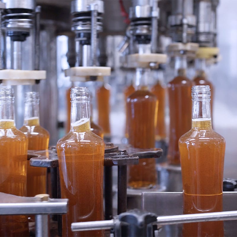 food-beverage-packaging-lines Food and beverage packaging line for liquid filling, capping and labeling